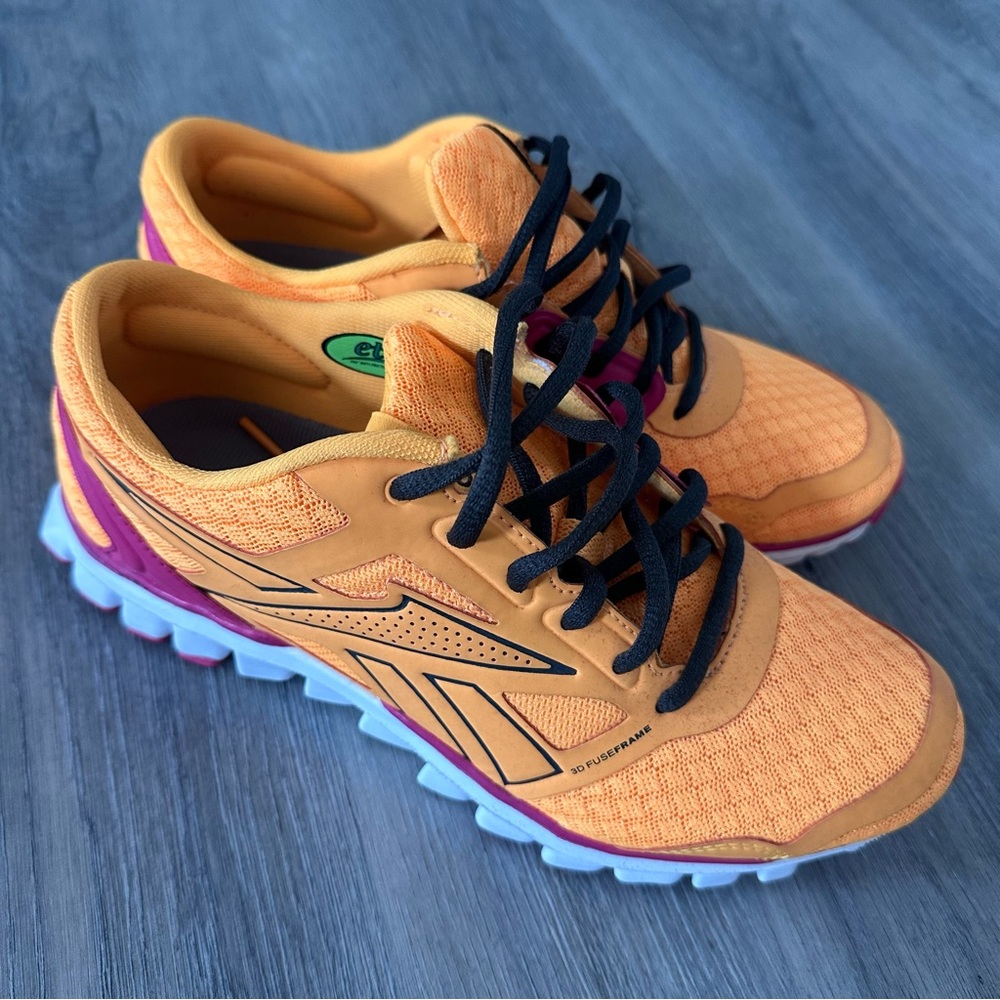 Reebok RealFlex Orange and Pink Athletic Women’s Shoes